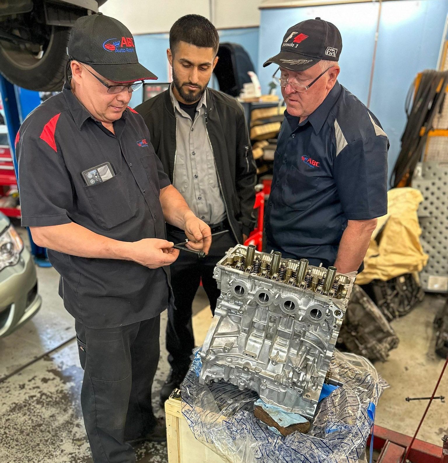 ABC Auto Repair master technicians in Burien working on complex engine repair