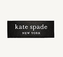 Black Kate Spade New York logo on a rectangular patch with white lettering.