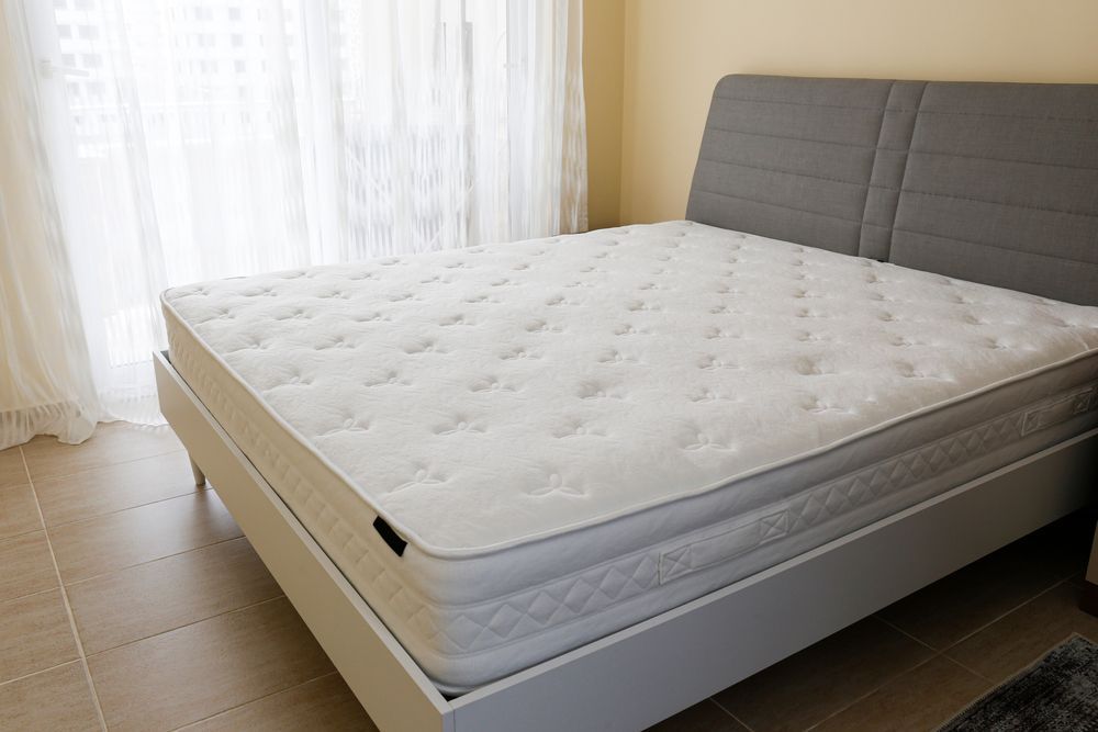 A Bed with A Mattress and Headboard — Water Works Waterbeds in Logan, QLD