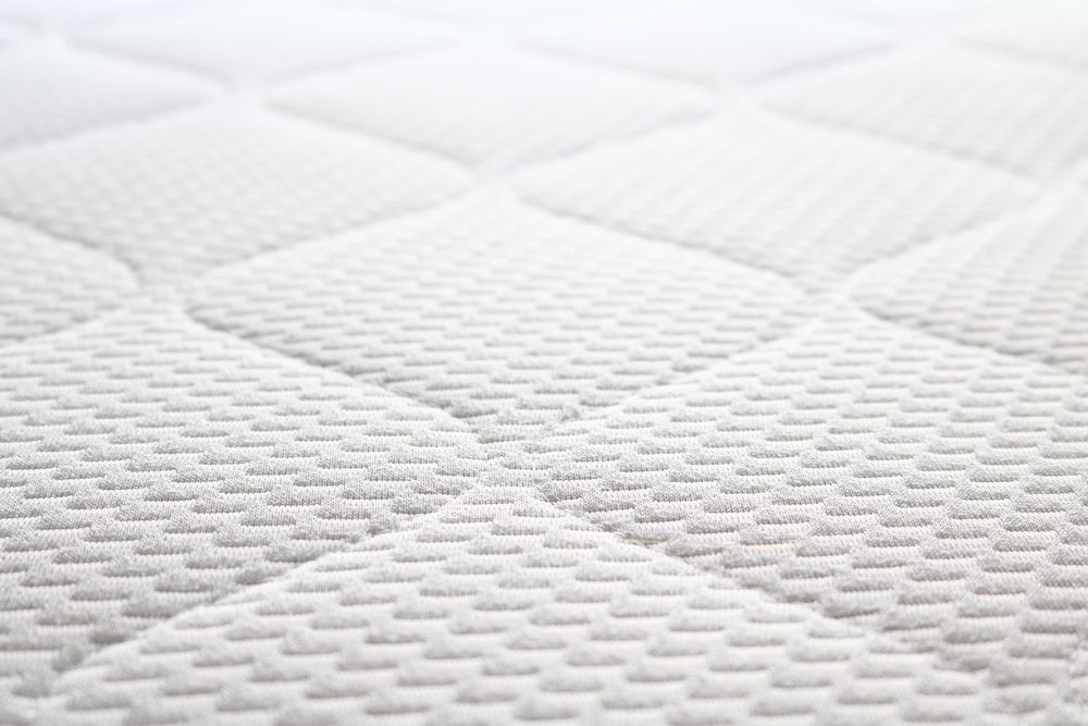 A White Quilted Mattress Surface with Pattern — Water Works Waterbeds in Logan, QLD