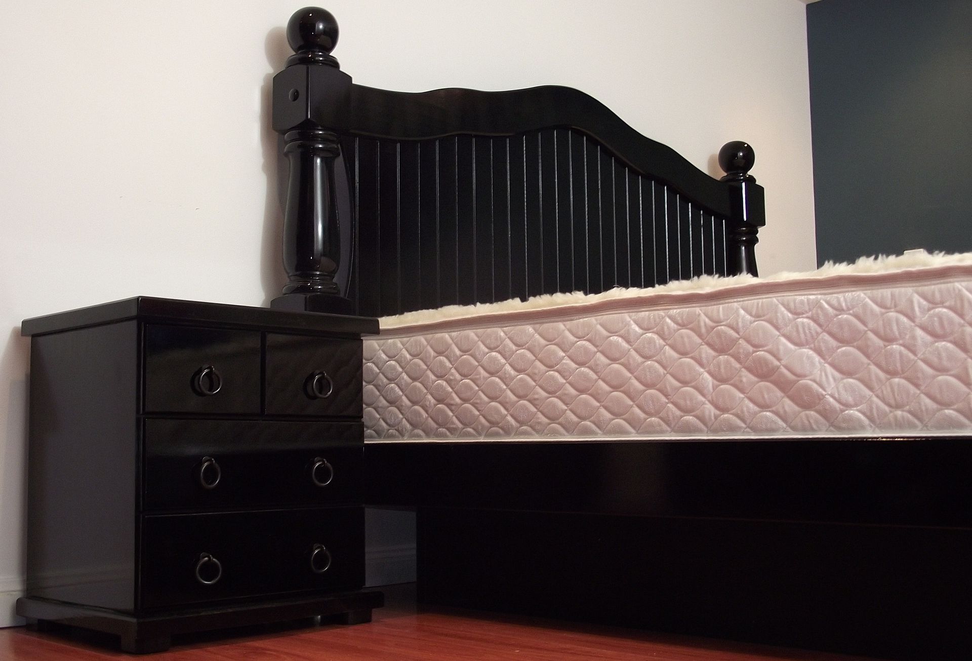 A Wooden Bed with Matching Nightstand — Water Works Waterbeds in Chermside, QLD