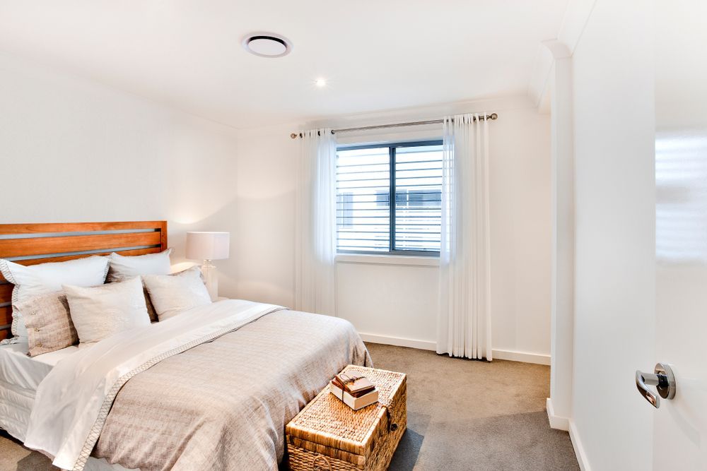 A Bedroom with Wooden Headboard — Water Works Waterbeds in Chermside, QLD