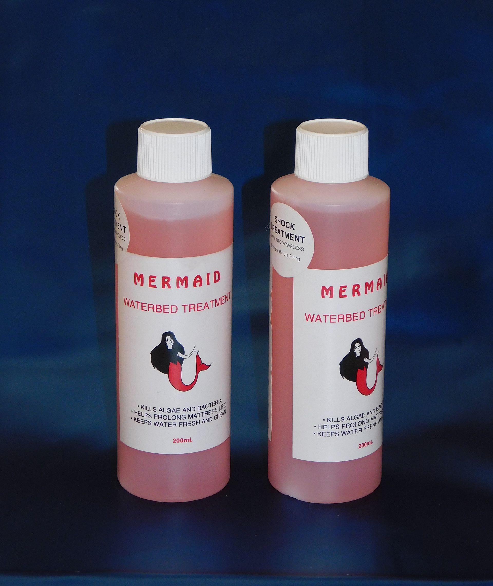 Two Bottles of Pink Liquid — Water Works Waterbeds in Sunshine Coast, QLD