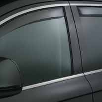 A close up of a car window with windshield shades on it.