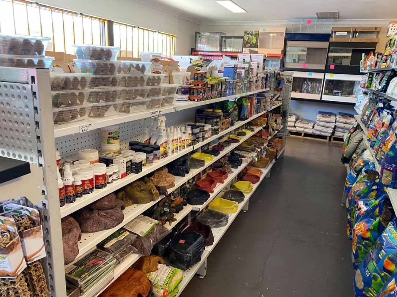 Pet Store Aisle With Shelves of Supplies — Jonath’s Animal Kingdom in Beresfield, NSW