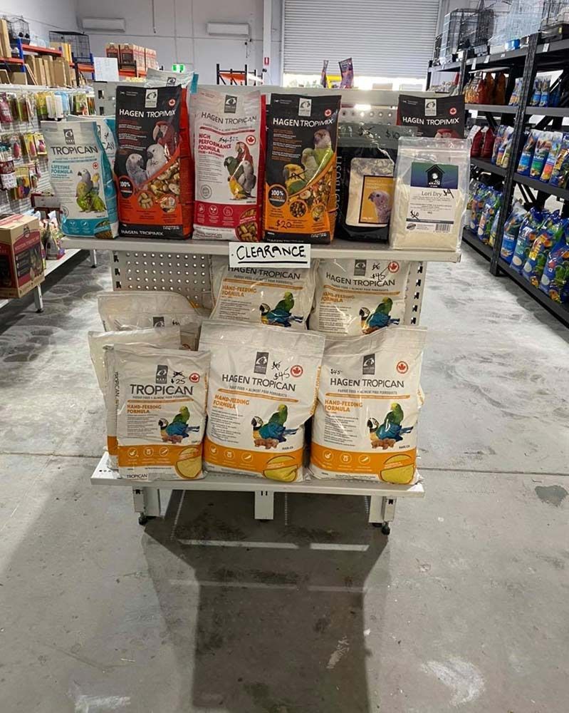 Bird Food Display in a Store in a White Shelves, and a Bright Interior — Jonath’s Animal Kingdom in Forster, NSW