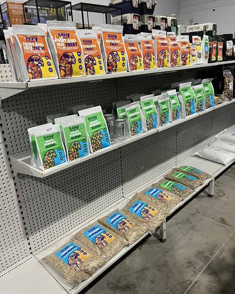 Shelves Stocked With Various Bags of Pet Food in a Store — Jonath’s Animal Kingdom in Maitland, NSW