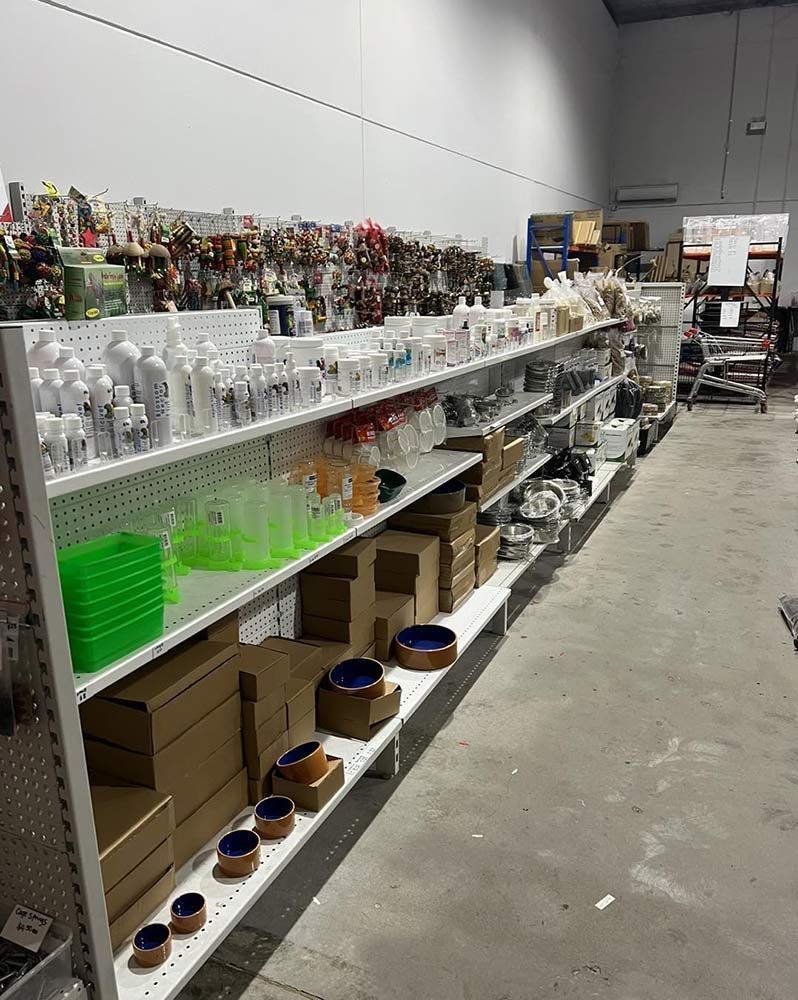 Shelves Stocked Items in a Store, Including Containers, Boxes, and Bowls — Jonath’s Animal Kingdom in Salamander Bay, NSW