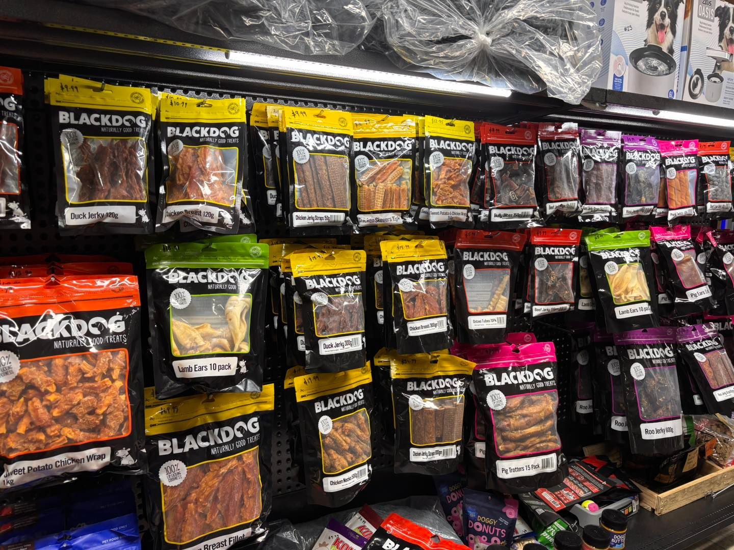 Shelves of Blackdog Dog Treats in Various Flavours and Colours at a Pet Store — Jonath’s Animal Kingdom in Beresfield, NSW