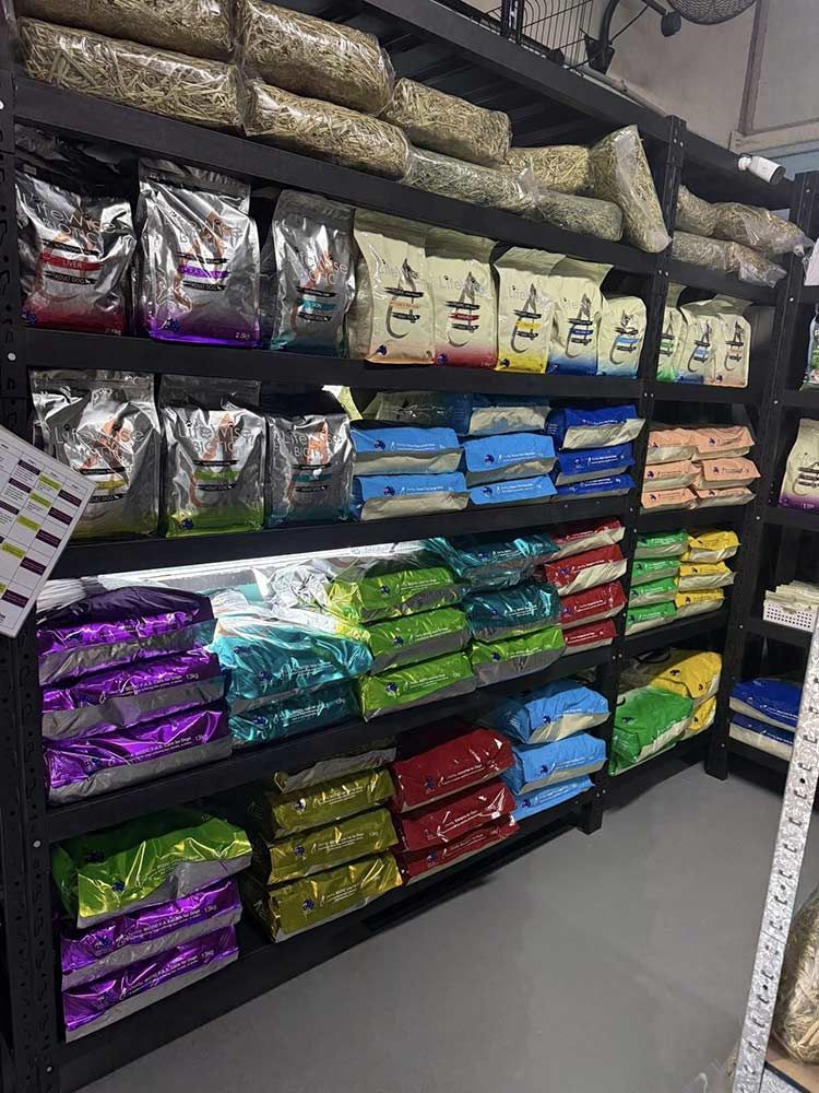 Shelves Stocked With Various Pet Food Bags in a Store — Jonath’s Animal Kingdom in Maitland, NSW