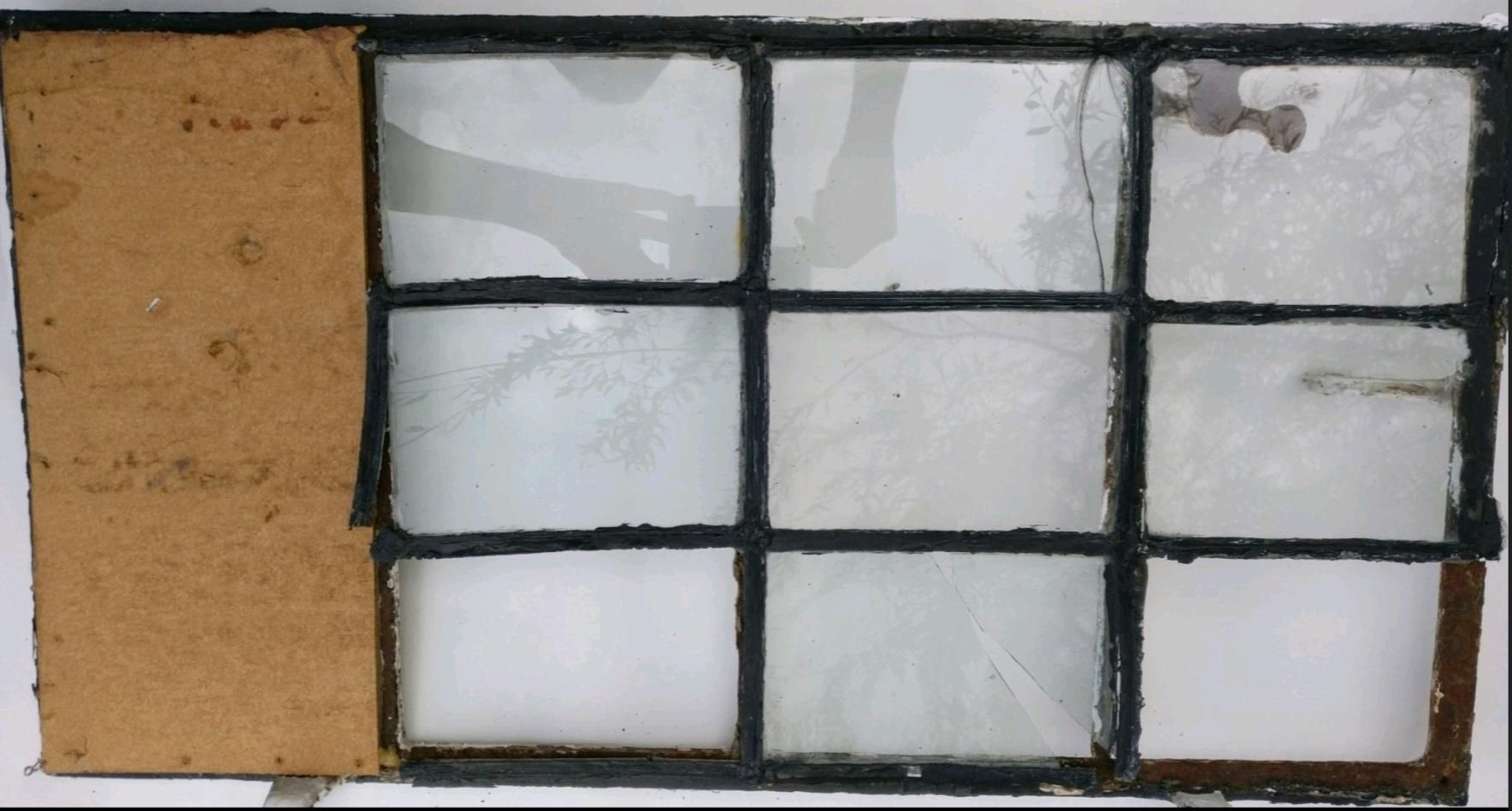 Badly damaged lead light window