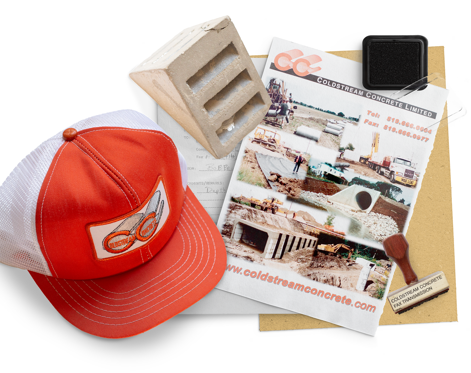 A hat is sitting on top of a piece of paper that says coldstreamconcrete.com