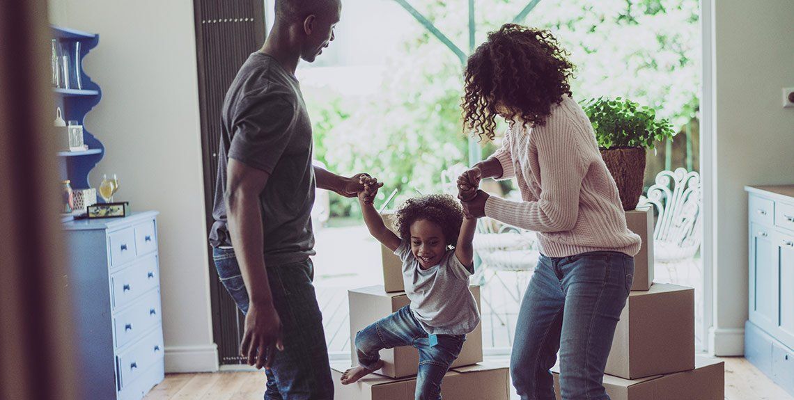 Family Moving Into New Home