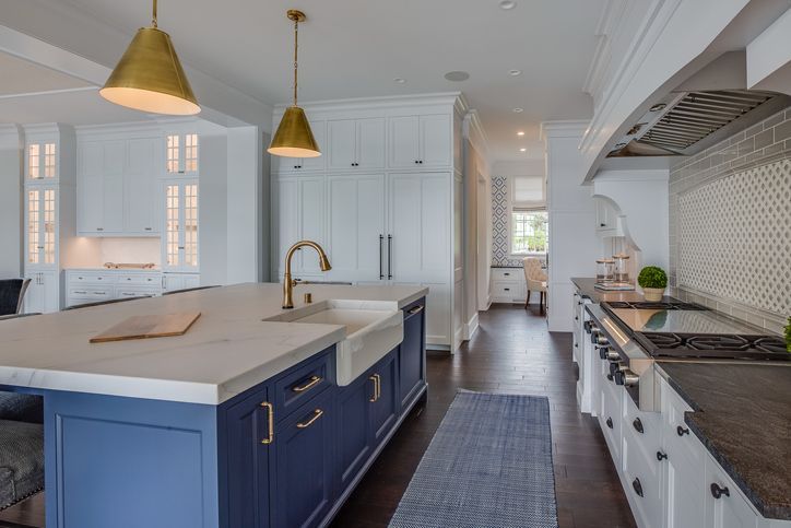 Blue island with brass or brushed gold pendant lights