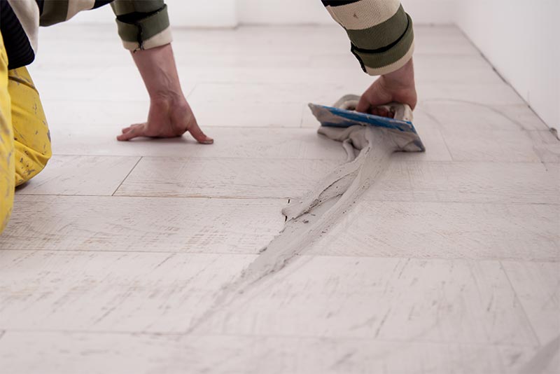 Tiler Grouting Tiles