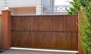 Garage Door — Brown Automatic Wooden Gate in Torrance, CA