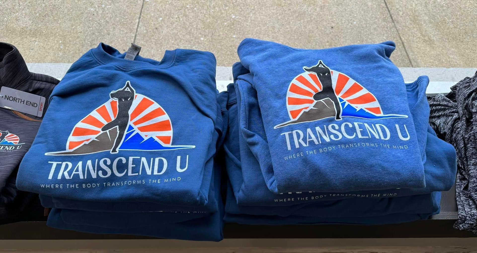 a woman is climbing up a climbing wall - Bouldering