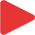 A red play button icon consisting of a triangle pointing to the right with rounded corners.