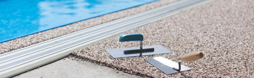 A Large Swimming Pool With A Fence Around It — Turn It Crete in St Georges Basin, NSW