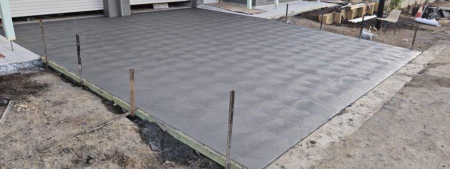 A Concrete Driveway Is Being Built In Front Of A House — Turn It Crete in St Georges Basin, NSW