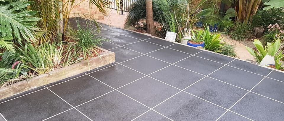 A Concrete Driveway Is Being Built in Front of A House — Turn It Crete in St Georges Basin, NSW
