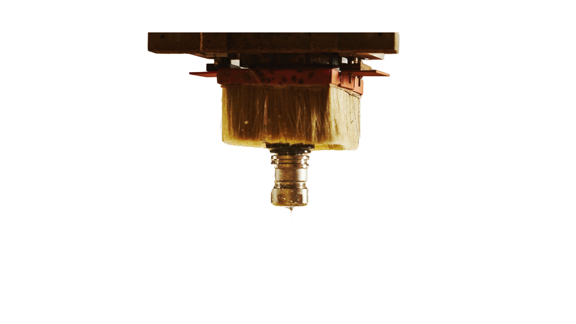 A close up of a wooden object on a white background.