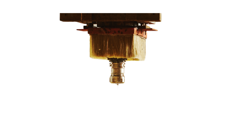 A close up of a wooden object on a white background.