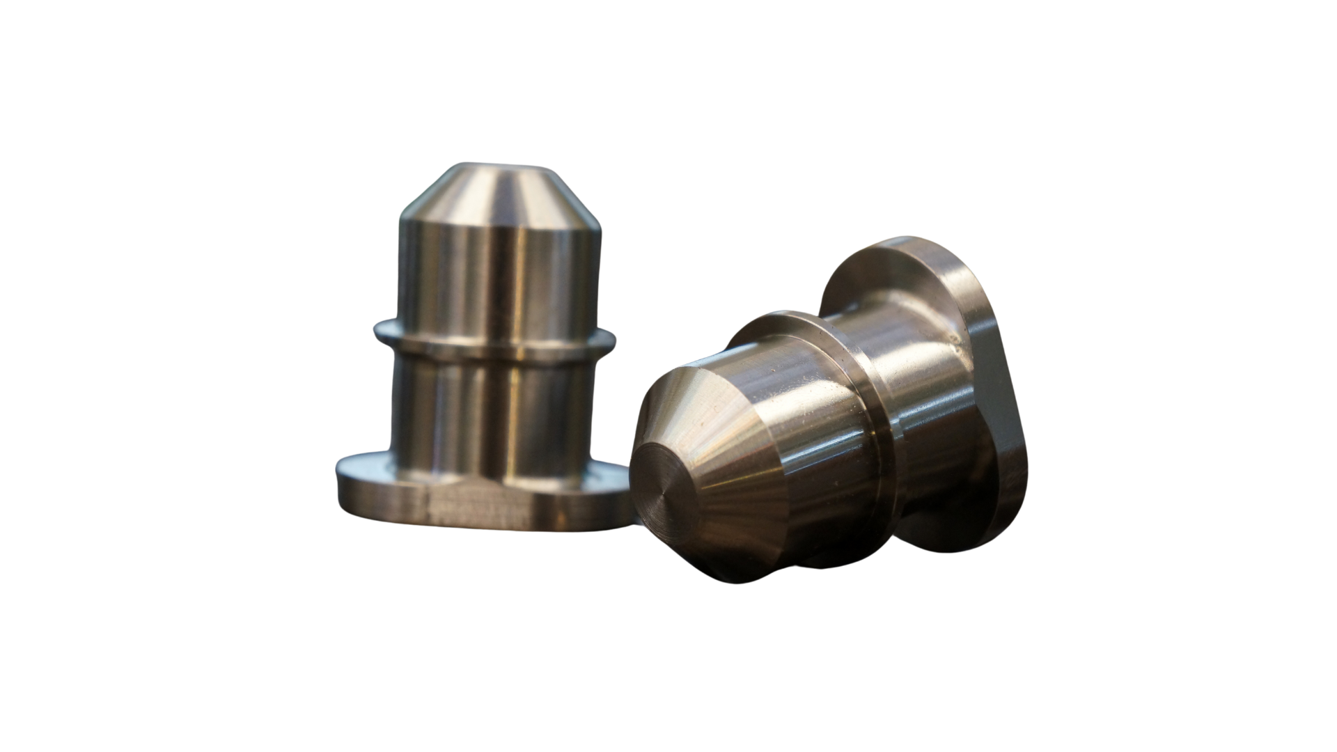 Two metal objects are sitting next to each other on a white background.