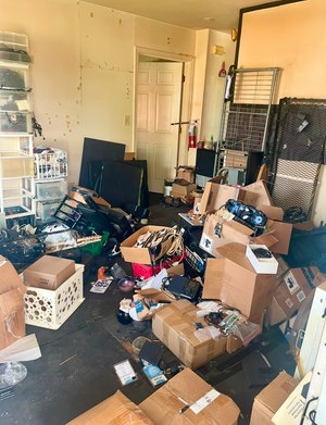 A room filled with lots of boxes and other items.