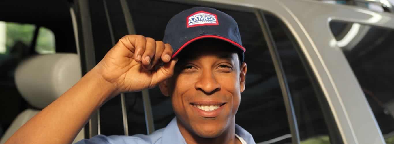 AAMCO tech smiling