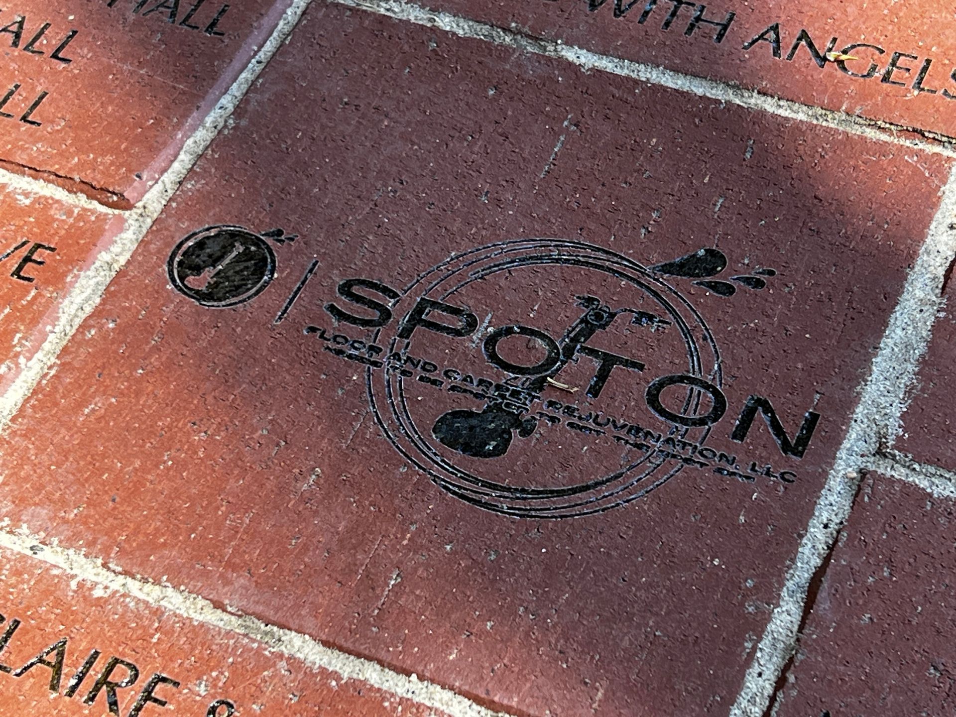 A brick with the word spotton written on it