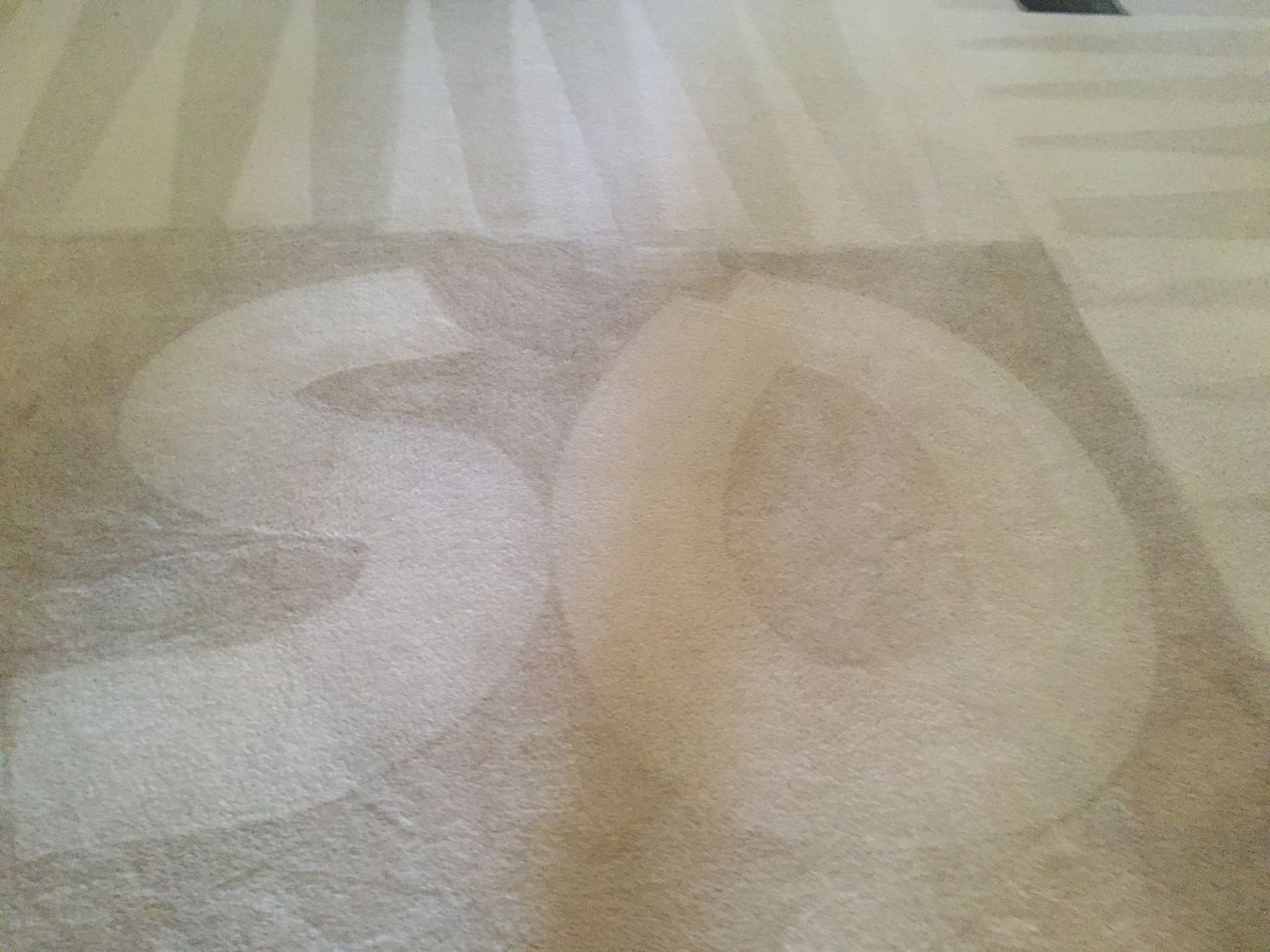 A close up of a carpet with the number 30 on it.