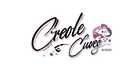 Logo for Creole Cuvee Wines: Script text and a sketch of a creature.