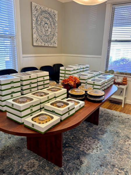 A table with a lot of boxes of food on it