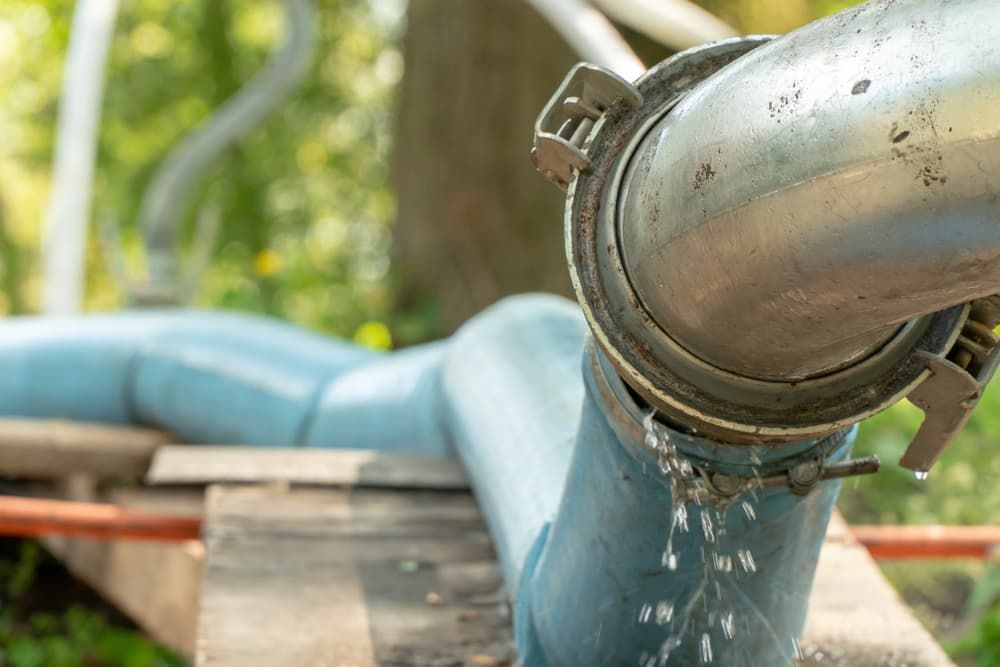 A Close up Of a Water Pipe with Water Coming out Of It — Blair Merlehan Plumbing in Wagga Wagga, NSW