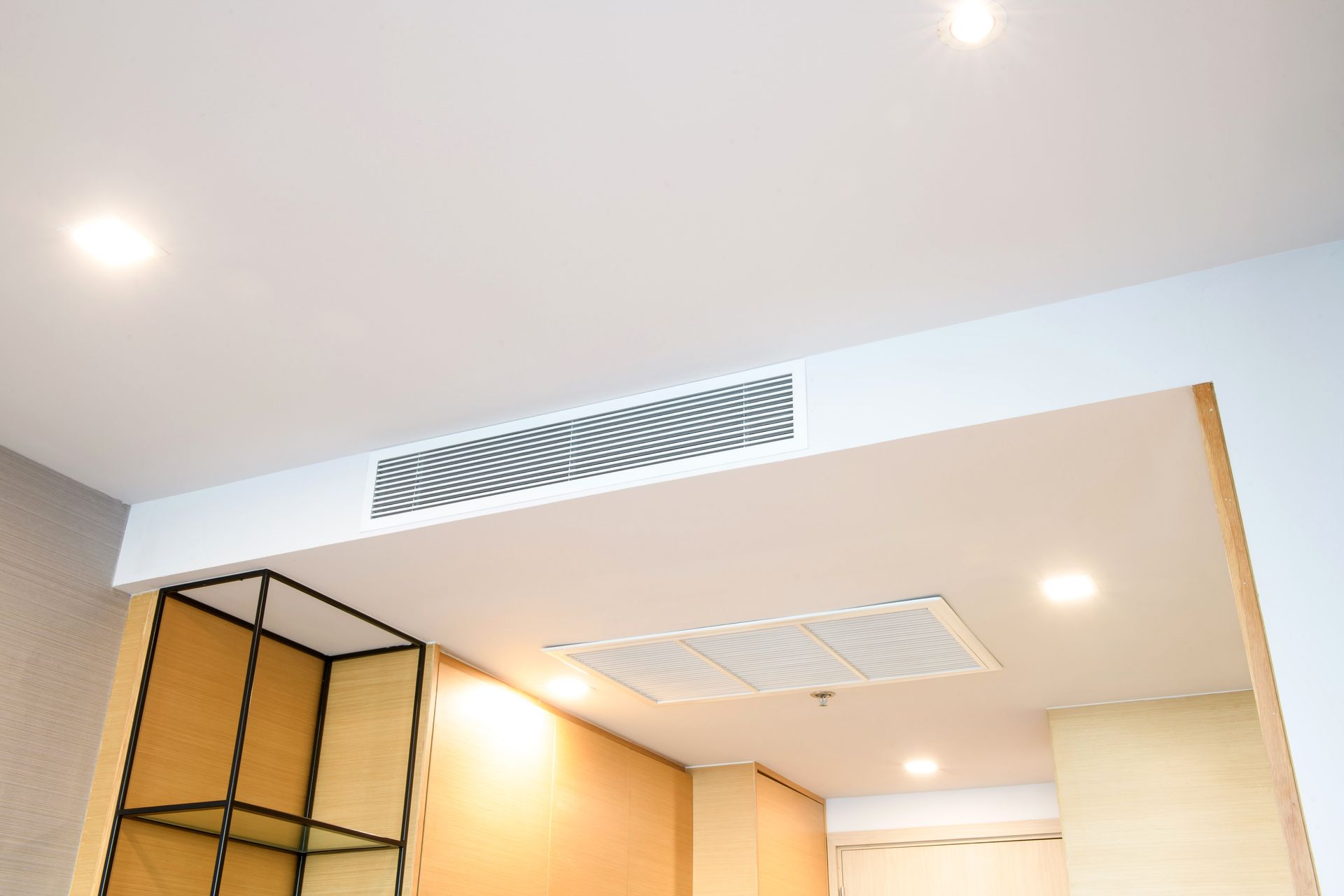 A Room With a Ceiling Fan and a Shelf — Blair Merlehan Plumbing in Wagga Wagga, NSW