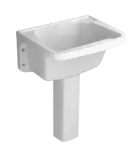 Uma pia branca com um pedestal preso a ela.
