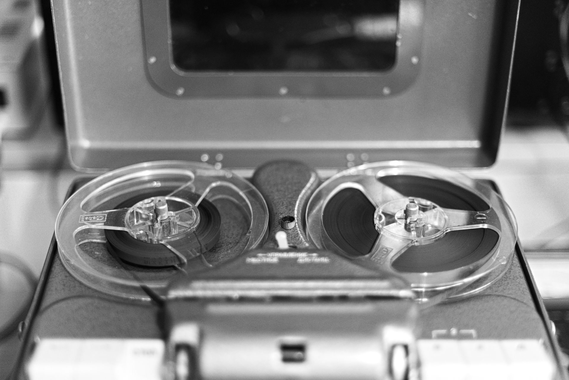 A black and white photo of a tape recorder