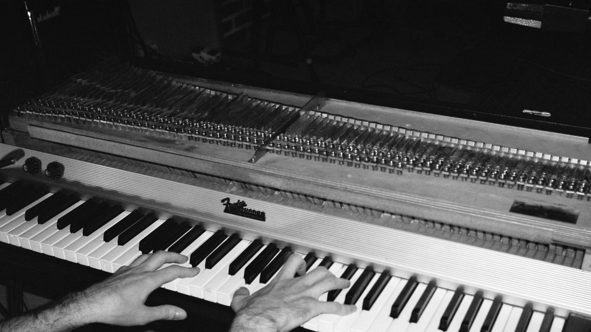 A black and white photo of rhodes electronics