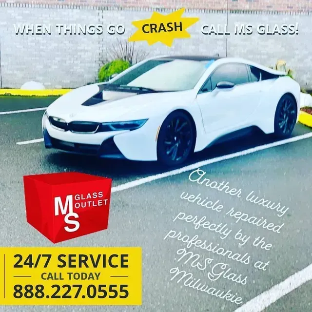 A white sports car parked on asphalt with promotional text for MS Glass Outlet and their phone number.