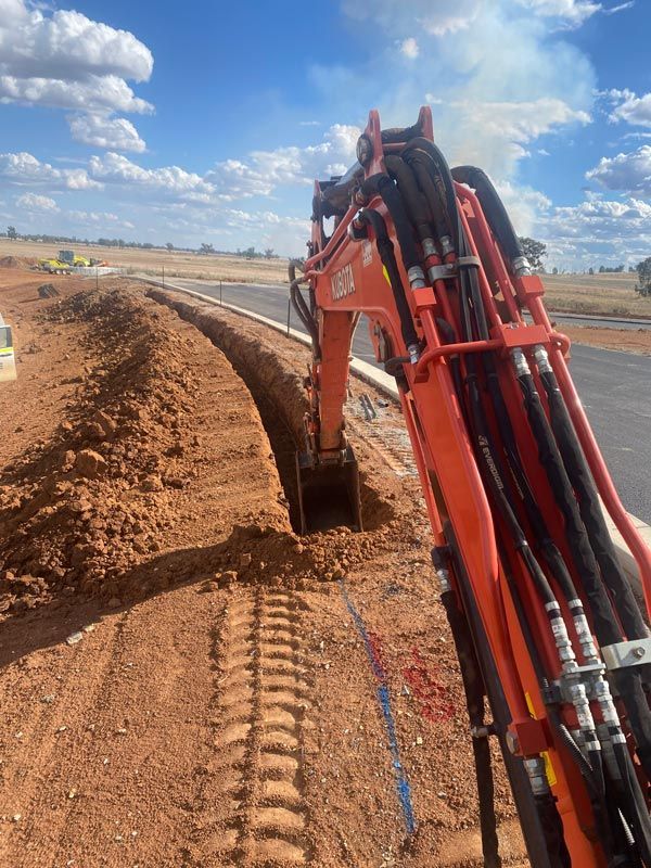 Excavator Digging Through Dirt — RL Hire In Dubbo, NSW