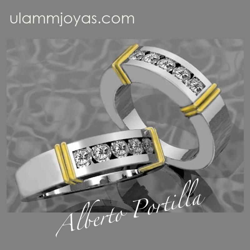 Un par de anillos de boda hechos por alberto portilla