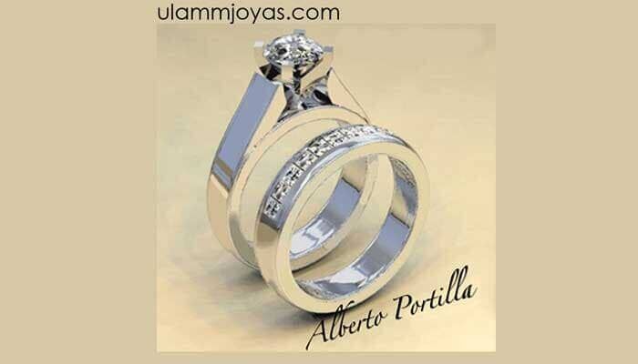 Un par de anillos de boda uno encima del otro