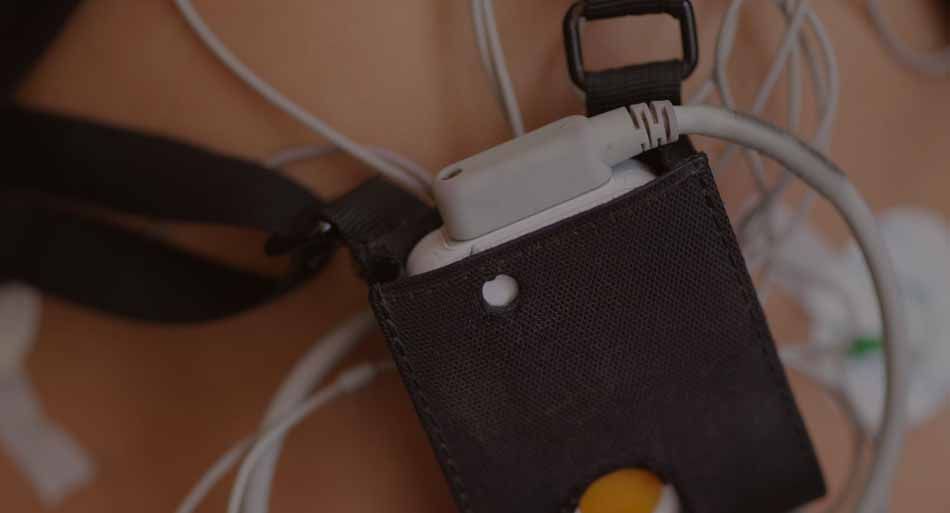A close up of a person 's chest with a device attached to it.