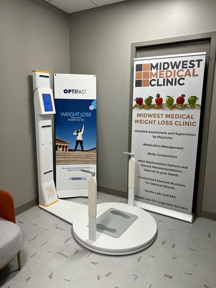 A woman is wearing a pair of jeans that are too small.