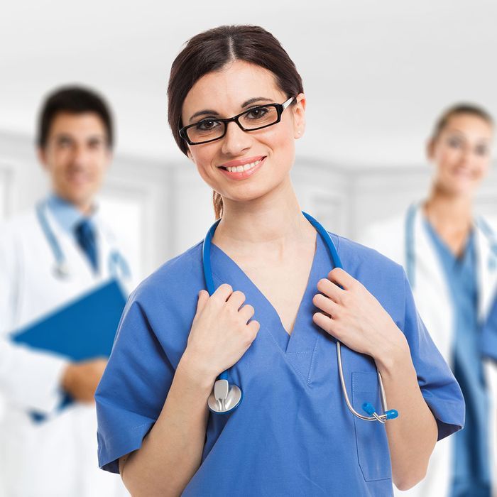 A female doctor with a stethoscope around her neck