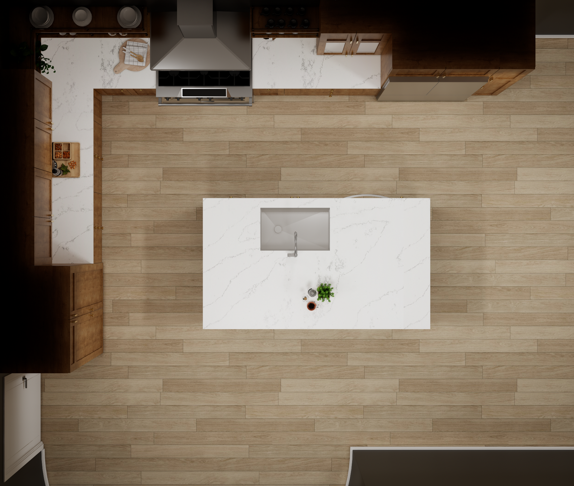 Overhead view of a kitchen with light-wood floors, white marble countertops, a central island with a sink, and brown cabinets.