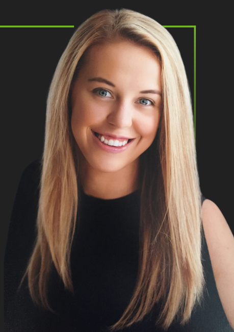 A woman with long blonde hair is smiling and wearing a black top