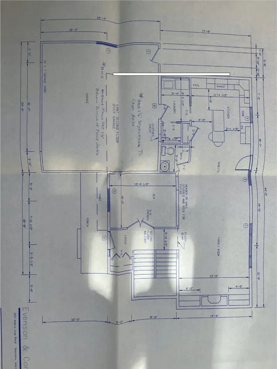 A blueprint of a house shows the floor plan