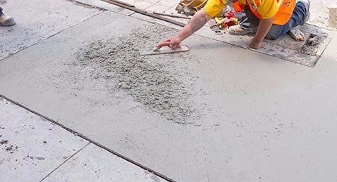 Finishing work being done on concrete 